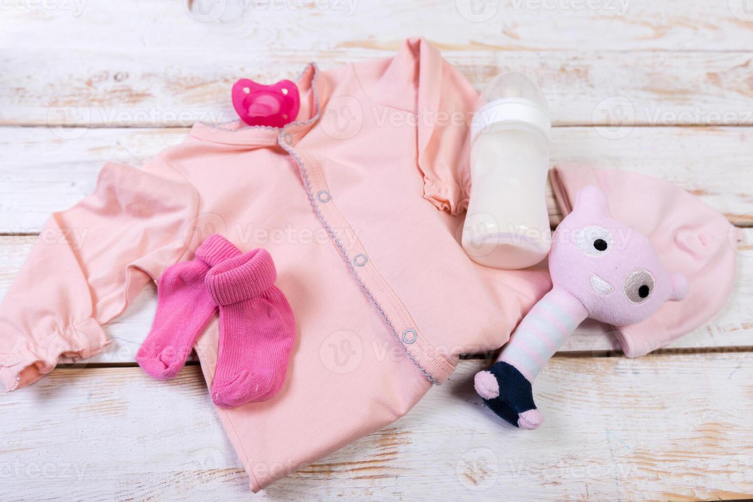 set of fashion trendy clothes and kids stuff for little baby girl photo