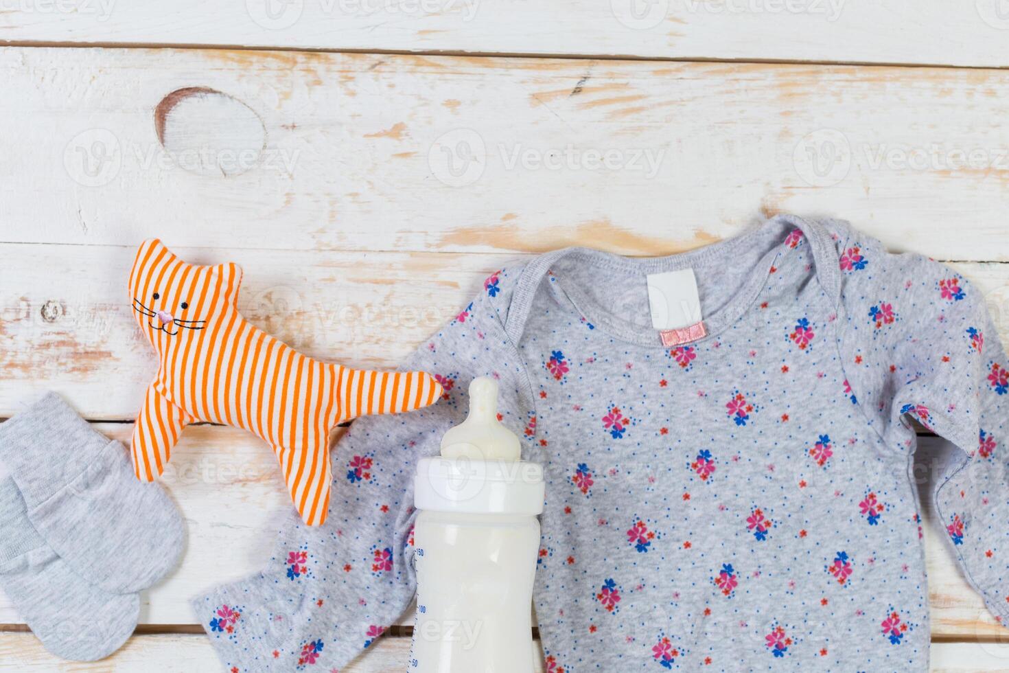 set of fashion trendy clothes and kids stuff for little baby girl photo