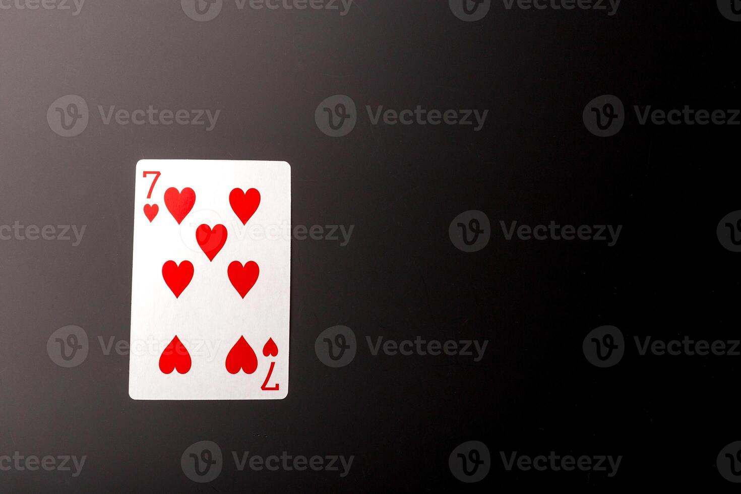 poker chips and cards on black background photo