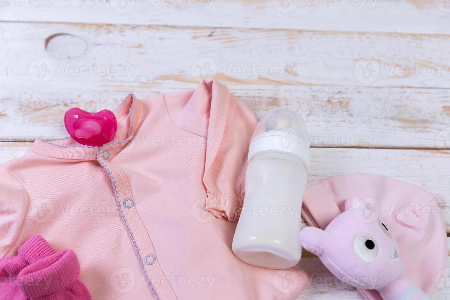 set of fashion trendy clothes and kids stuff for little baby girl photo