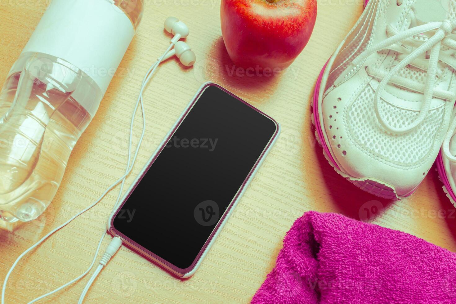 Sport stuff on wooden table, top view photo