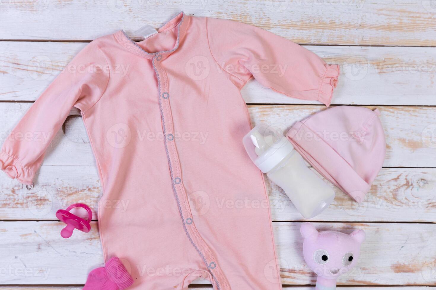 set of fashion trendy clothes and kids stuff for little baby girl photo