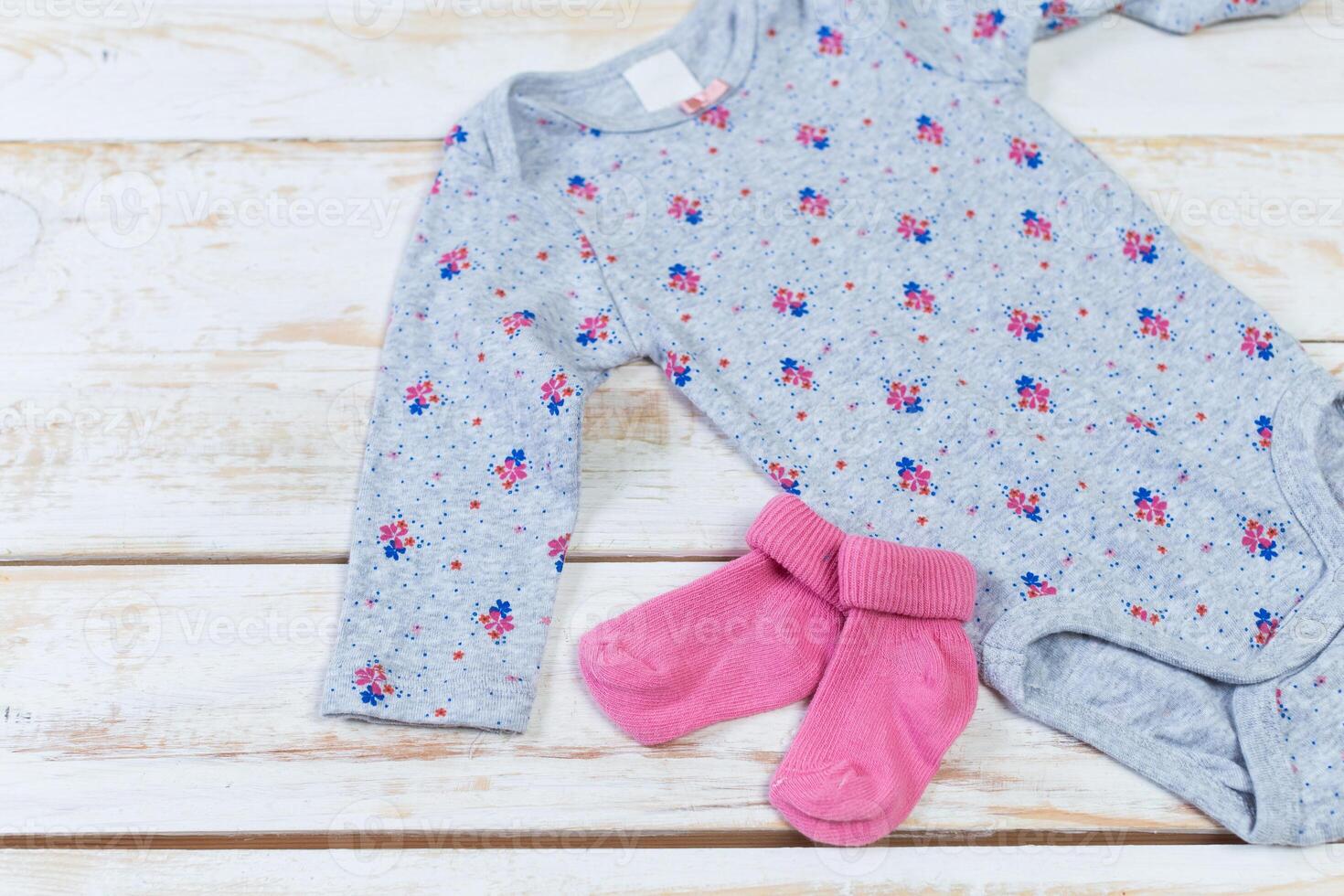 set of fashion trendy clothes and kids stuff for little baby girl photo