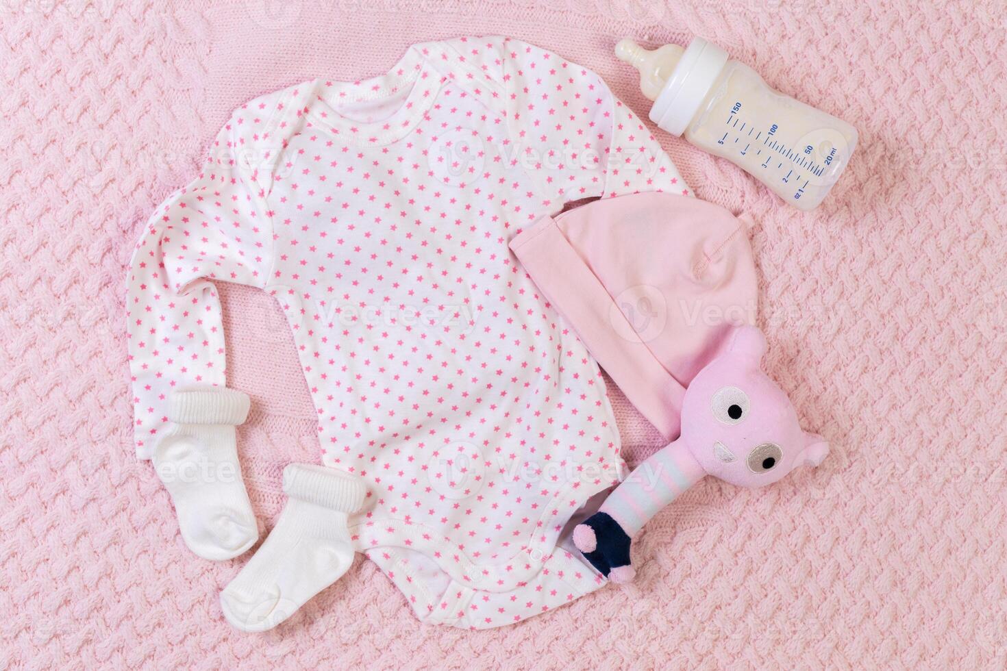 set of fashion trendy clothes and kids stuff for little baby girl photo