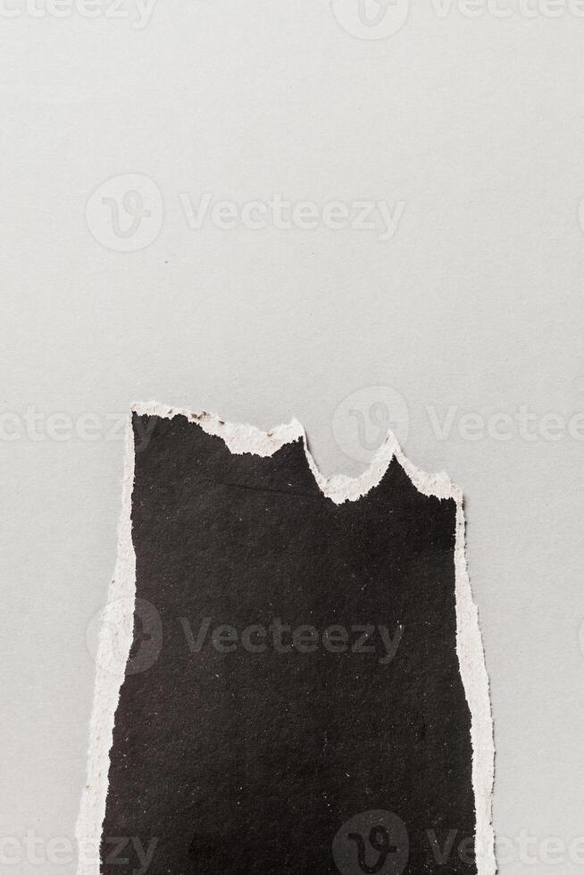 black ripped paper photo