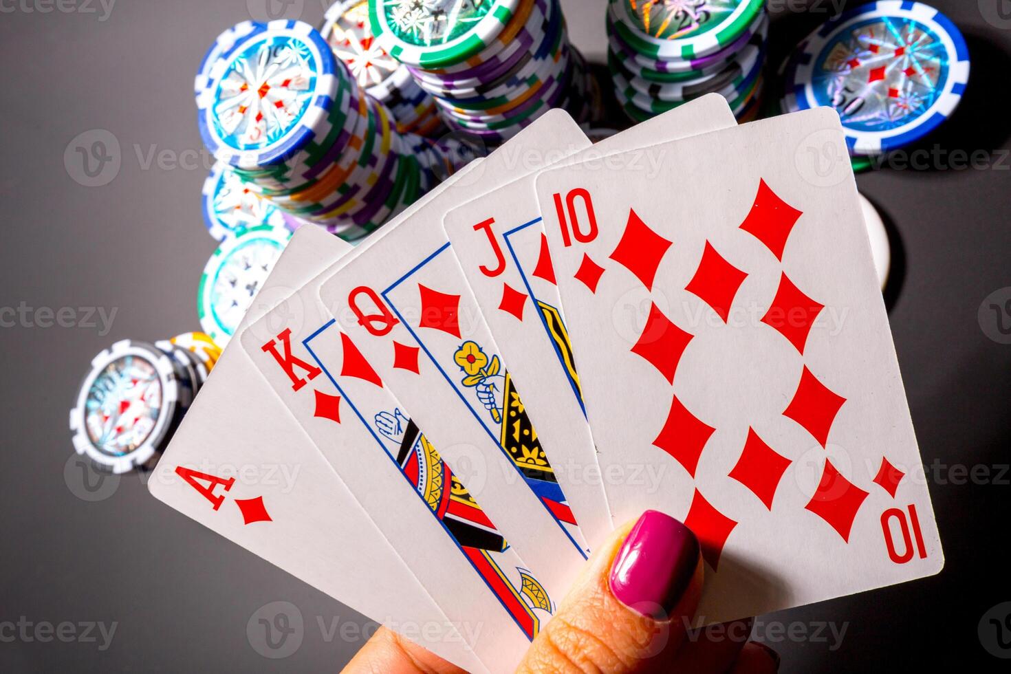 poker chips and cards on black background photo