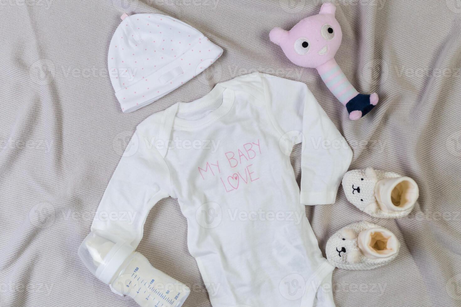 set of fashion trendy clothes and kids stuff for little baby girl photo