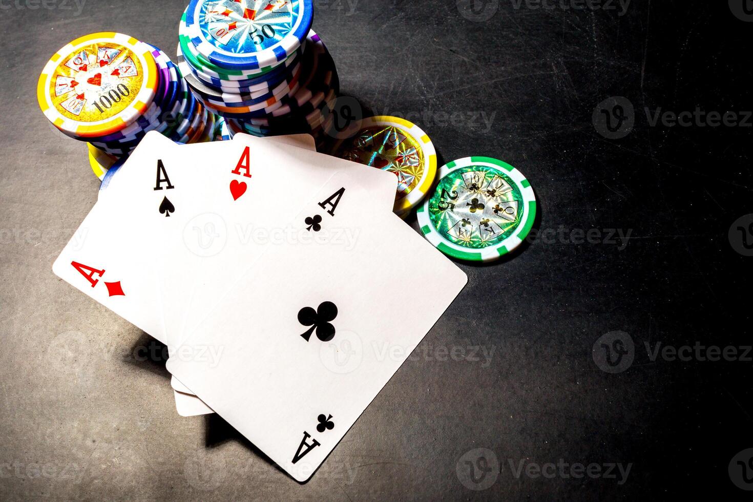 poker chips and cards on black background photo