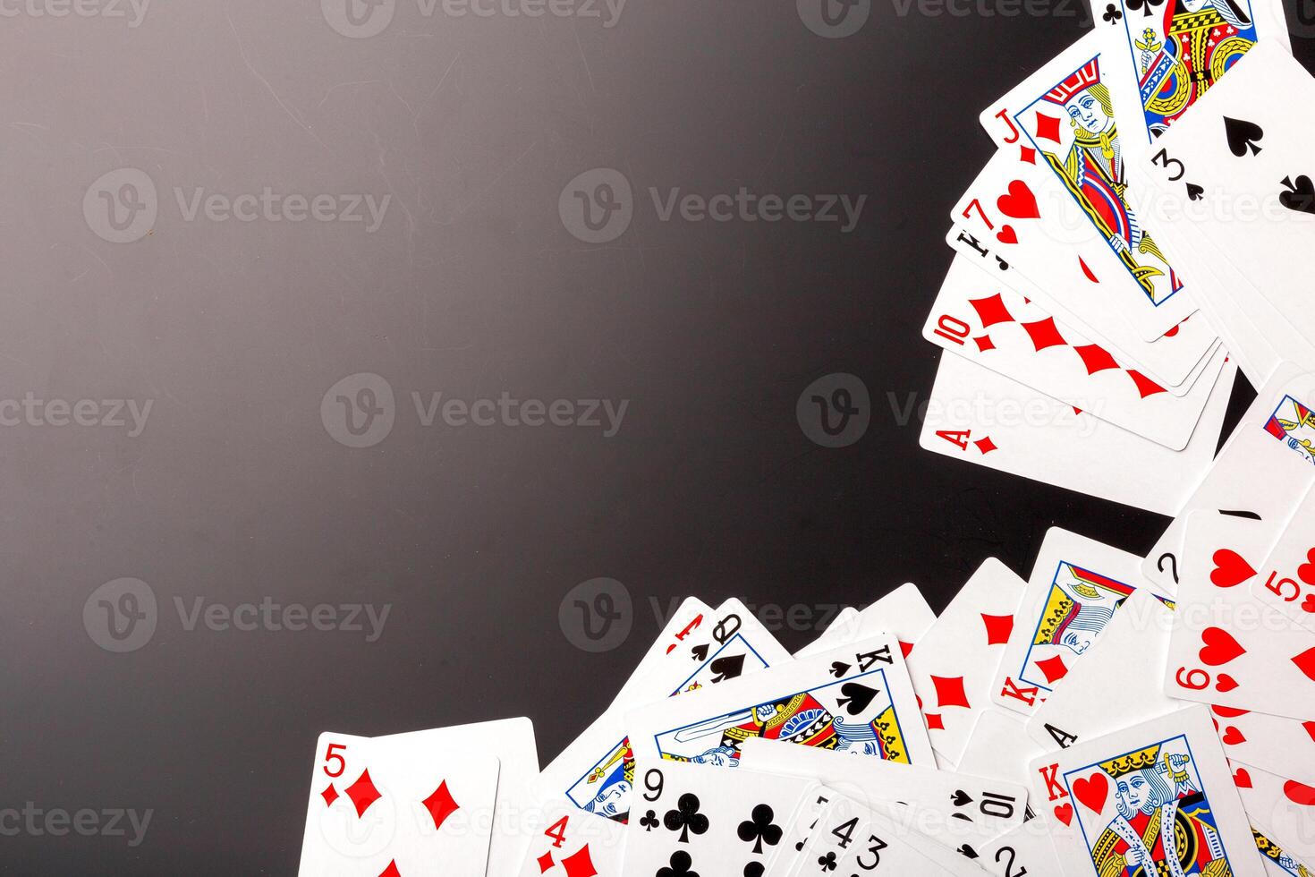 poker chips and cards on black background photo