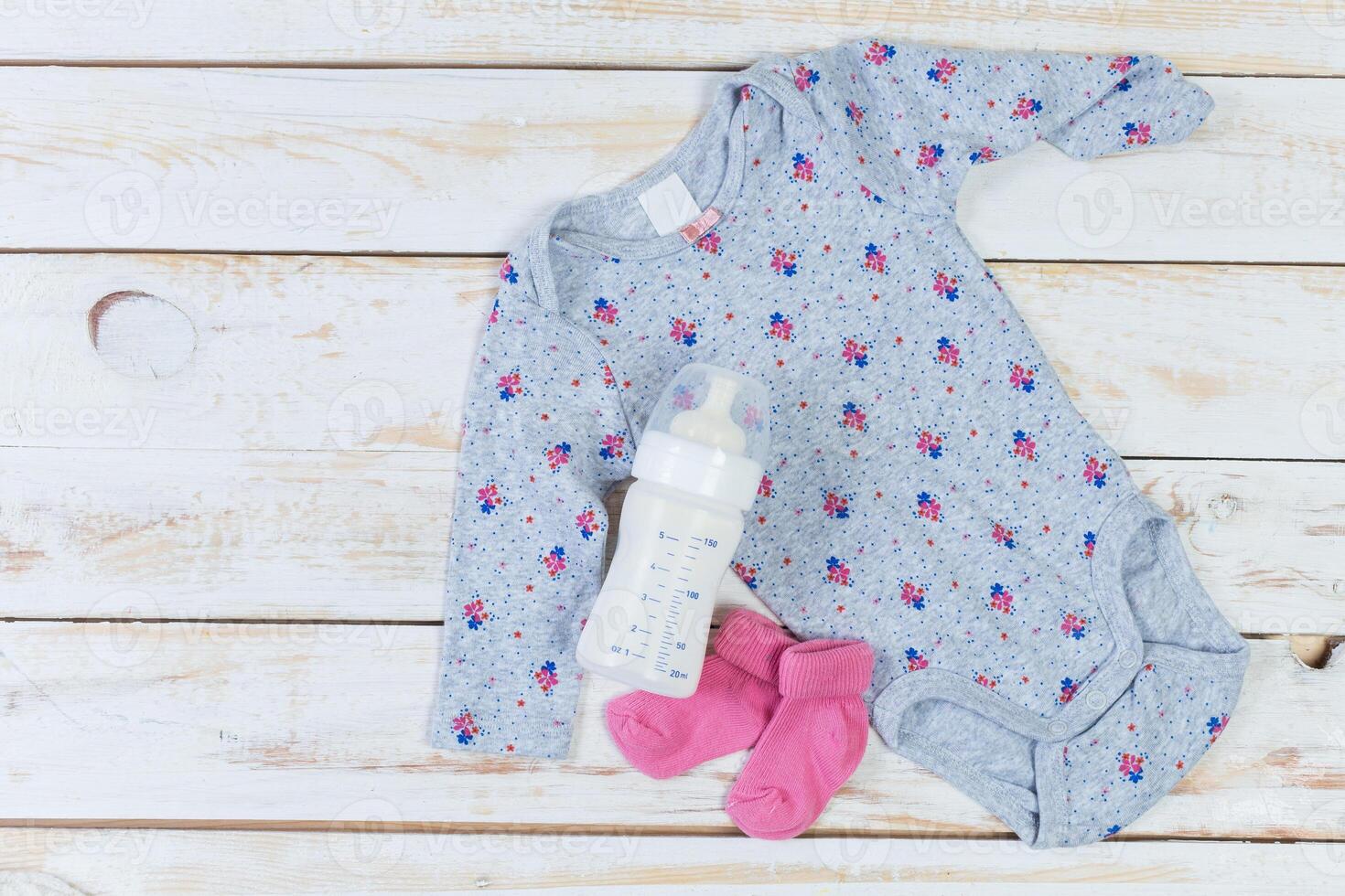 set of fashion trendy clothes and kids stuff for little baby girl photo