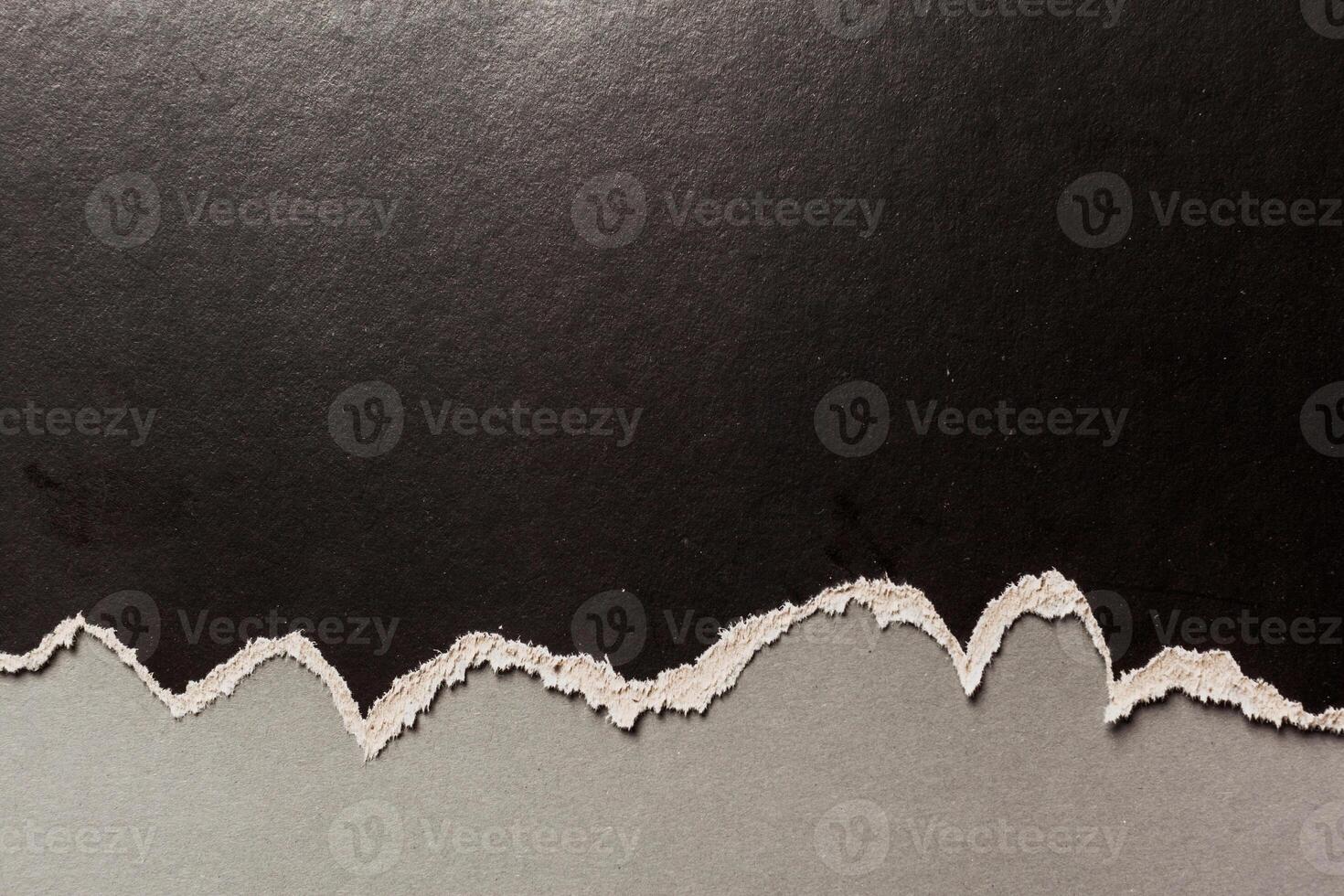 black ripped paper photo