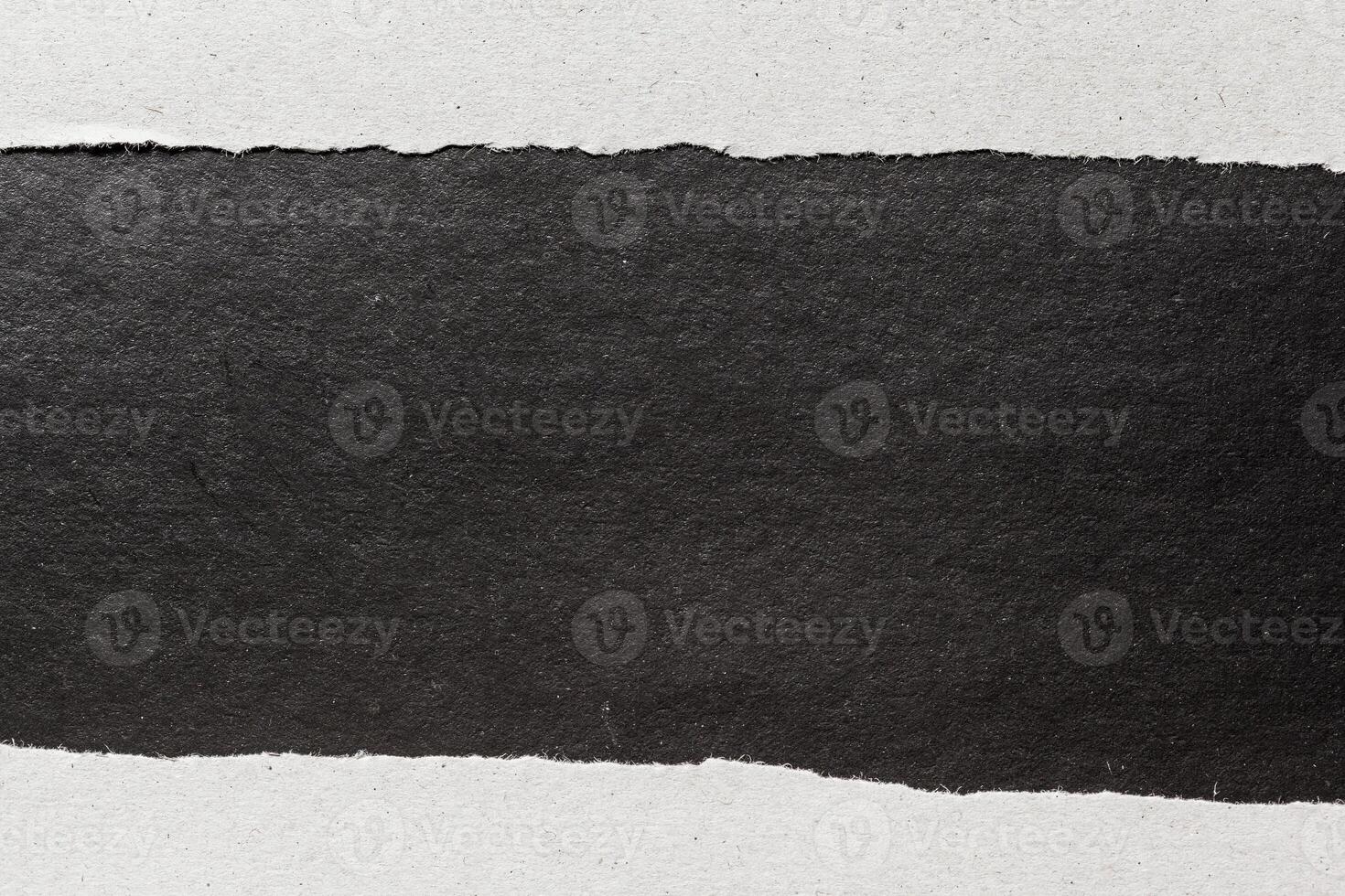 black ripped paper photo