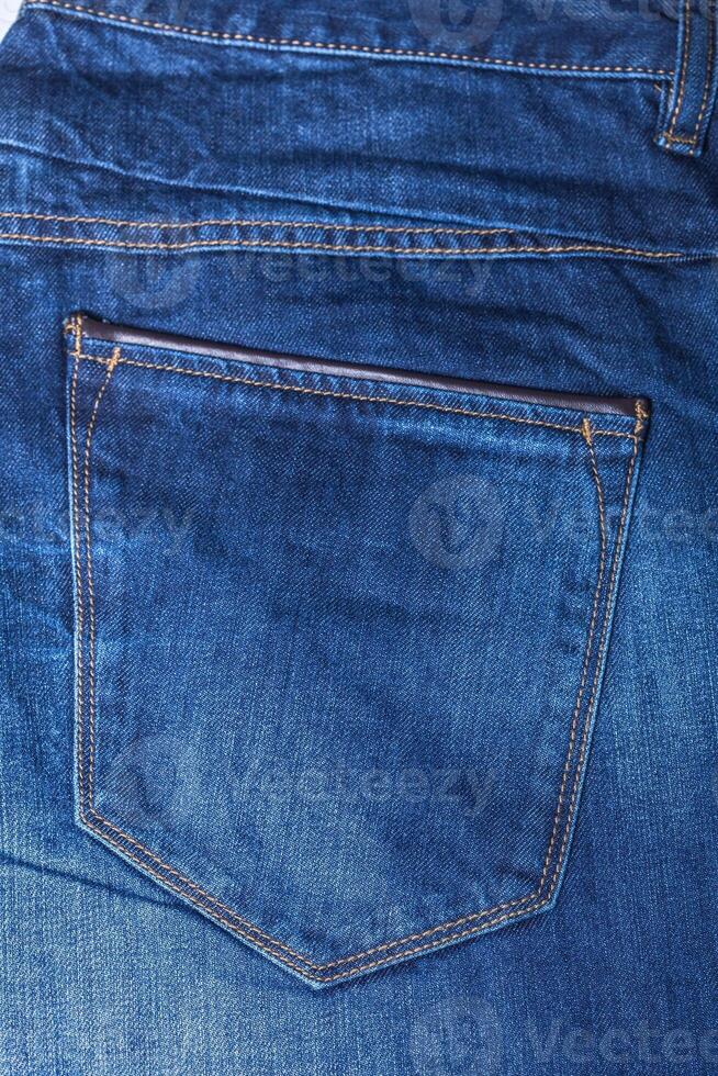 Detail of blue jeans photo