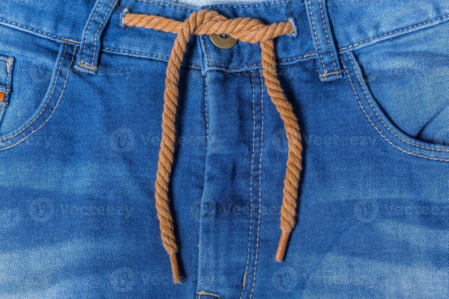 Detail of blue jeans photo