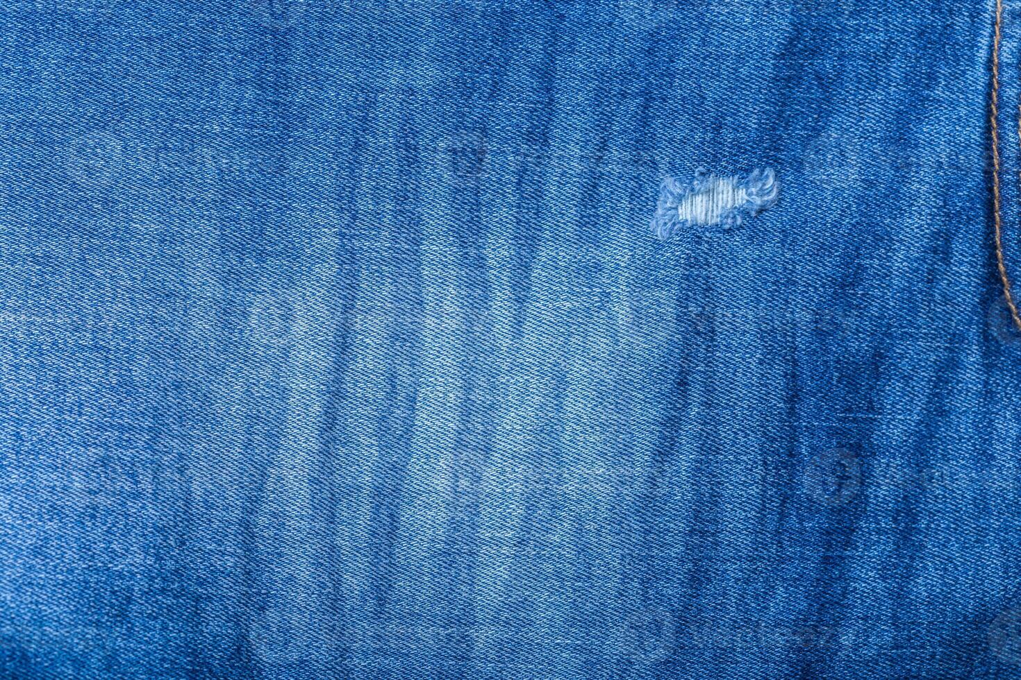Detail of blue jeans photo