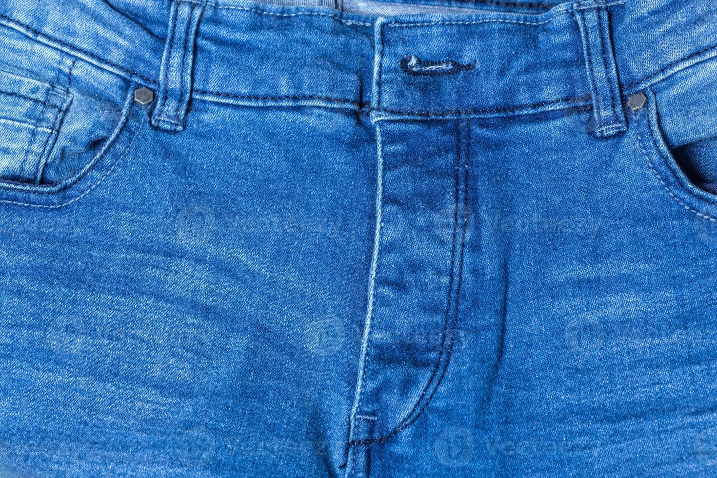 Detail of blue jeans photo