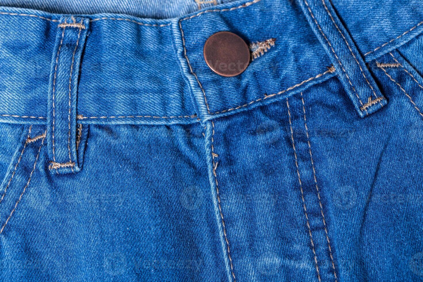 Detail of blue jeans photo