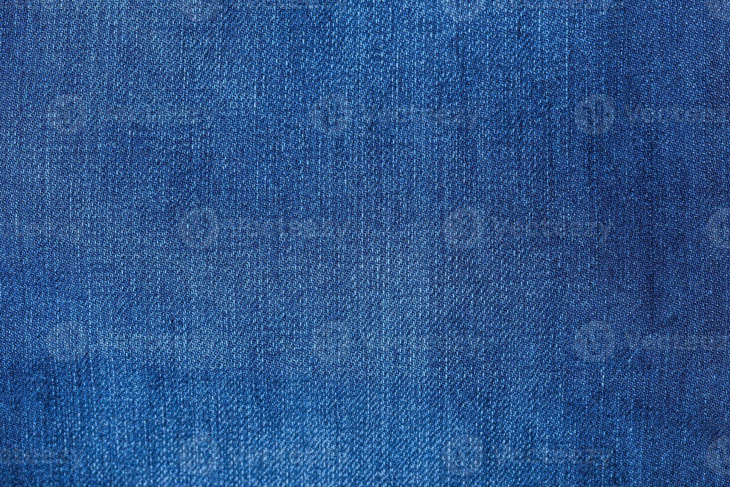 Detail of blue jeans photo