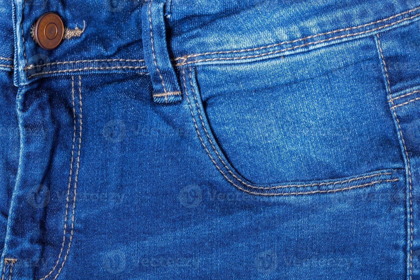 Detail of blue jeans photo