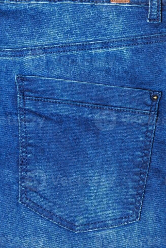 Detail of blue jeans photo