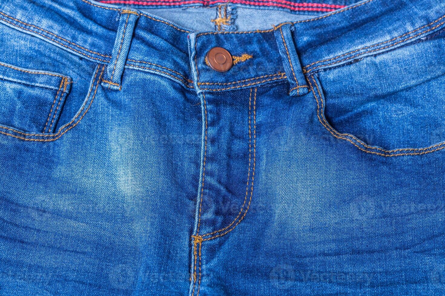 Detail of blue jeans photo