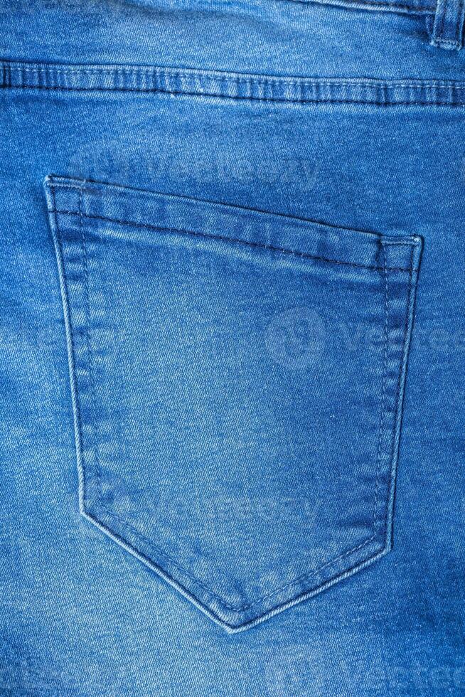 Detail of blue jeans photo