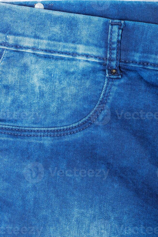 Detail of blue jeans photo