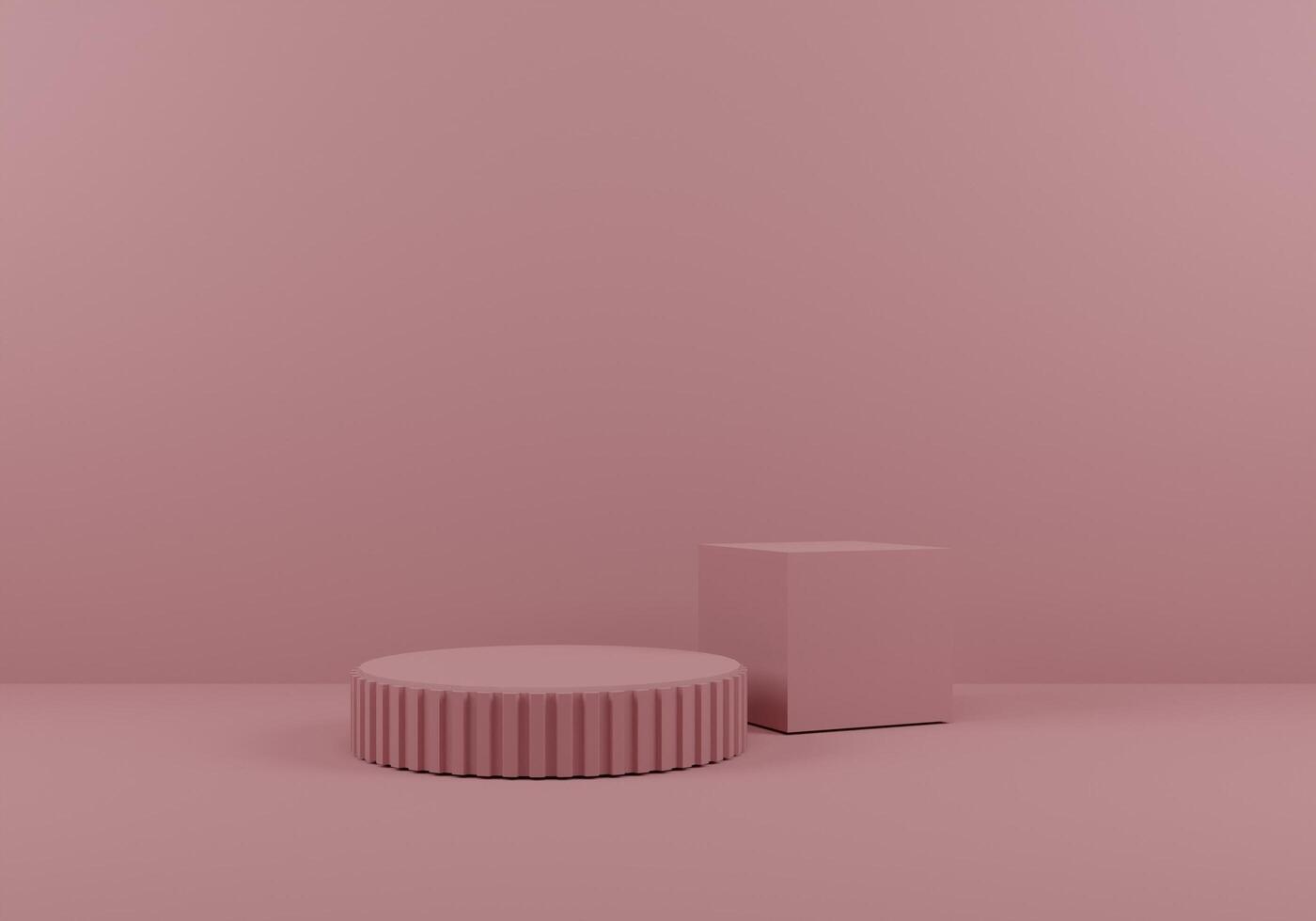 Minimalist Pink Cube and Ribbed Round Platform Design in Soft Lighting photo