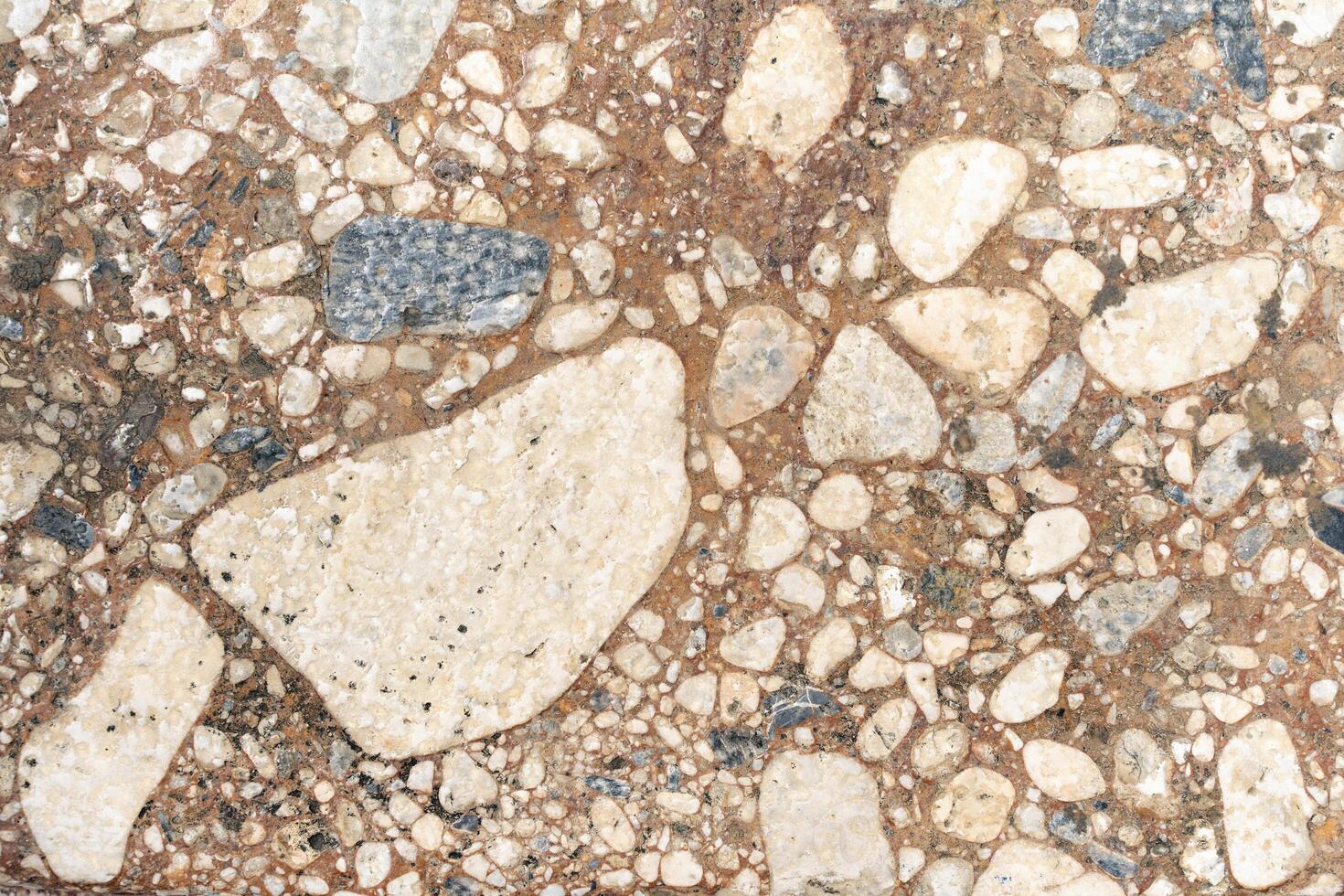 Texture of stone wall showing different sized rocks photo