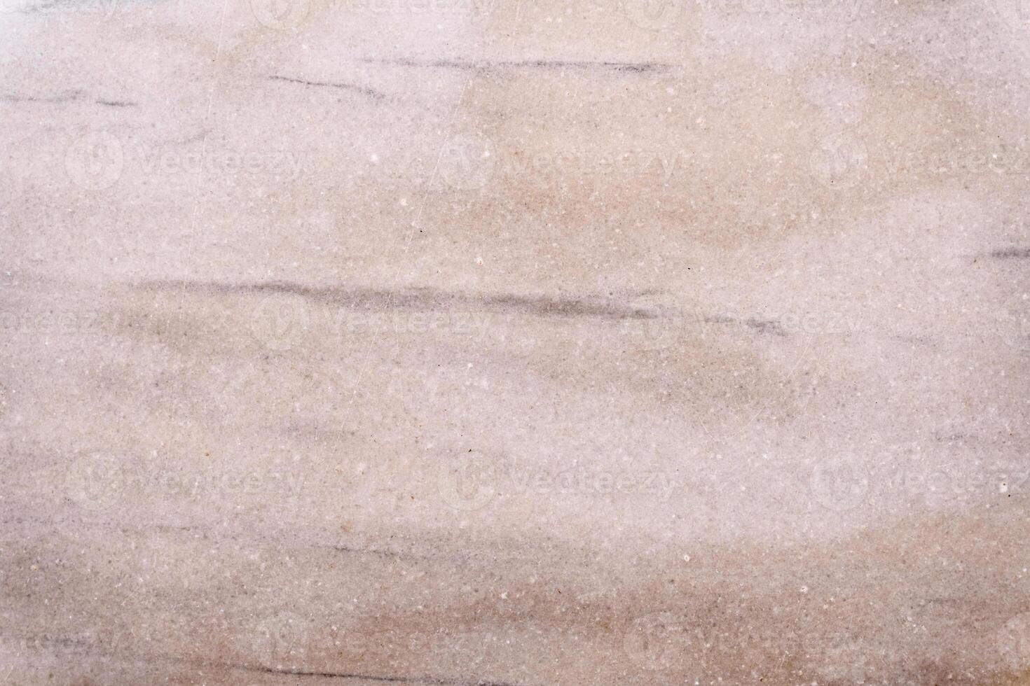 Polished stone surface showing interesting texture ideal for background photo