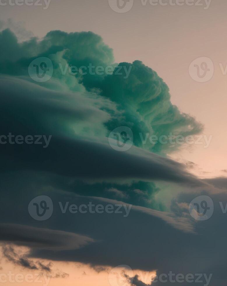 A large green cloud is seen in the sky photo