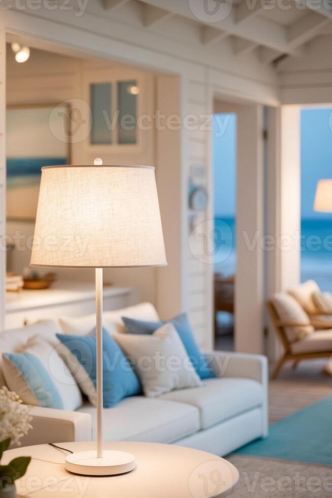 A living room with a white couch and a lamp photo