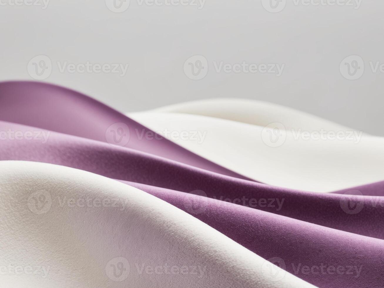 A purple and white fabric with a wave pattern photo