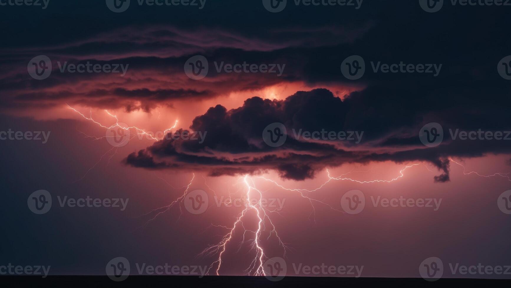 Lightning strikes over a cloud in the sky photo