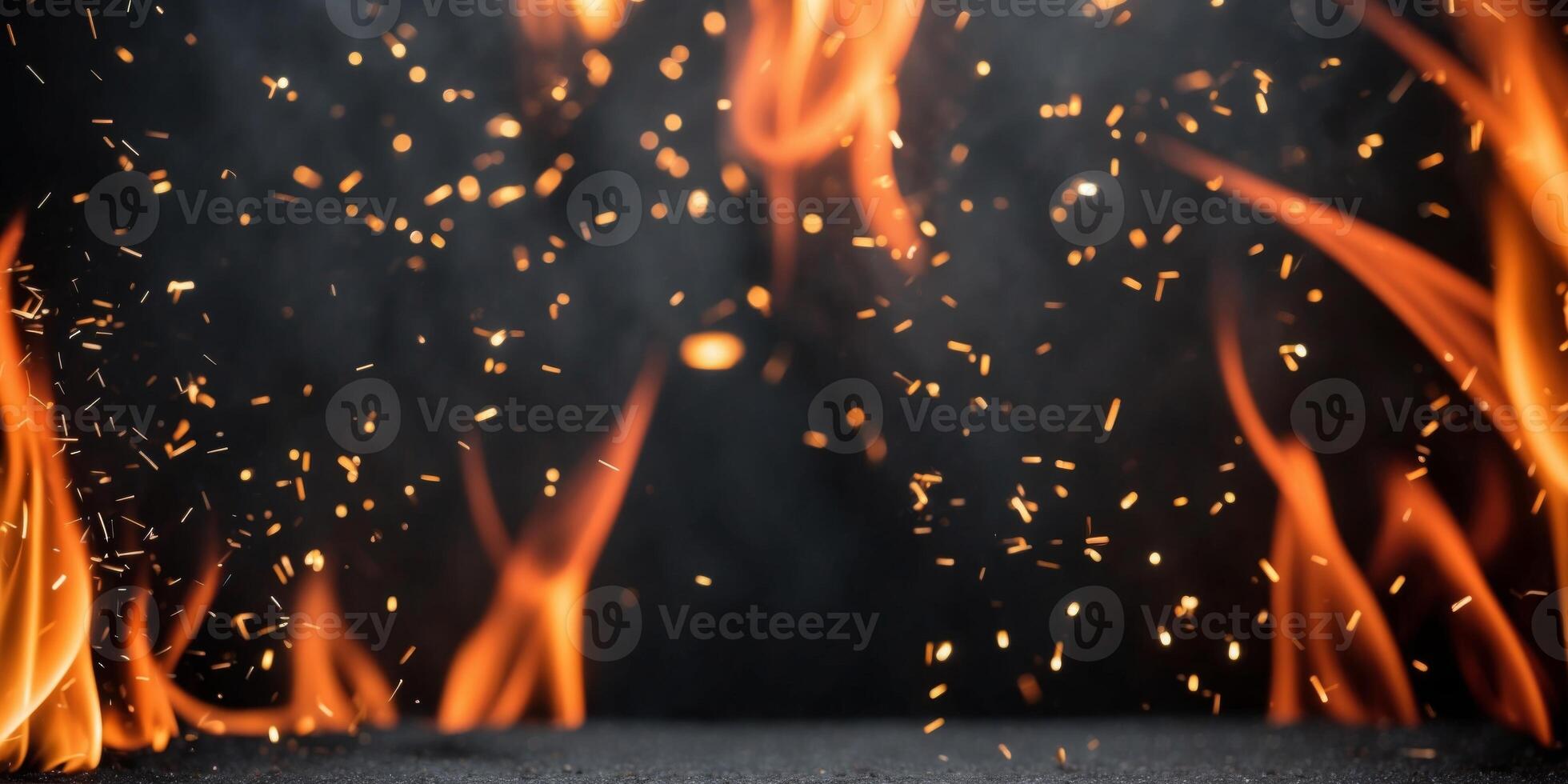 Fire and sparks on a black background photo