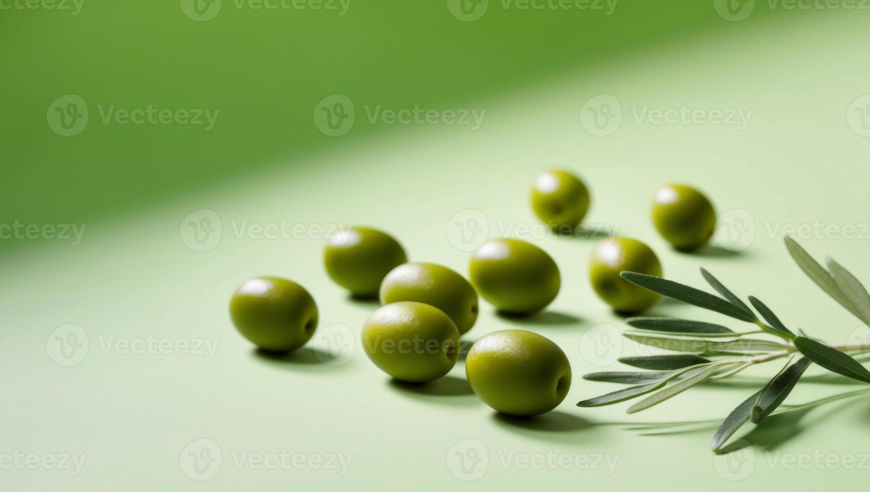 Olives on a green background photo