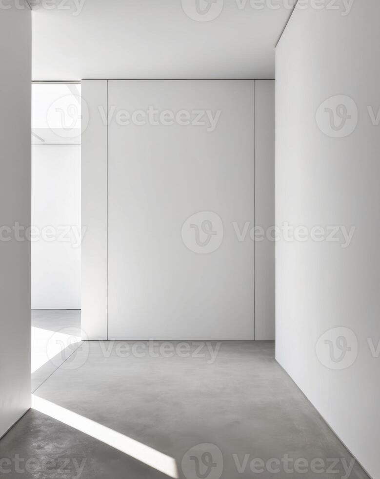 An empty room with white walls and a concrete floor photo