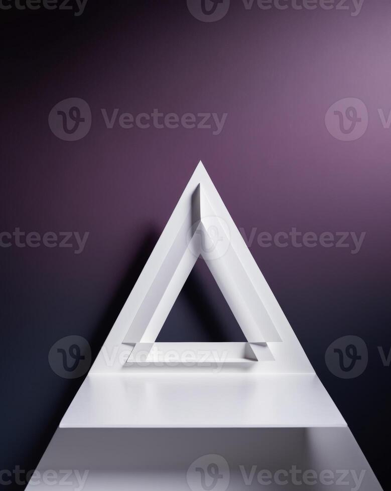 A triangle shaped object on a purple background photo