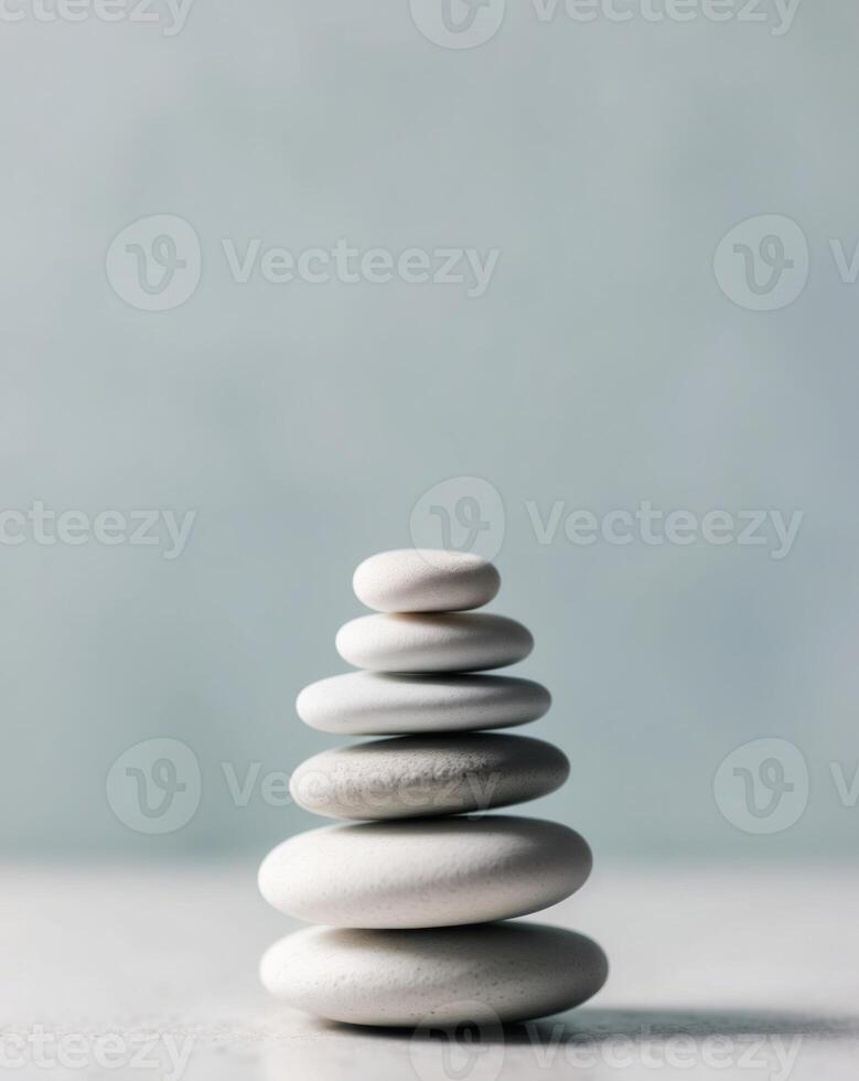 A stack of white stones on a table photo