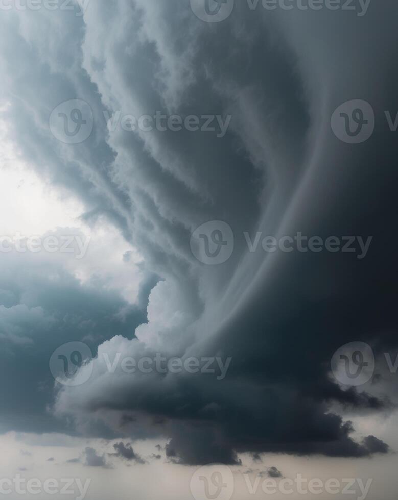 A large storm cloud is seen in the sky photo