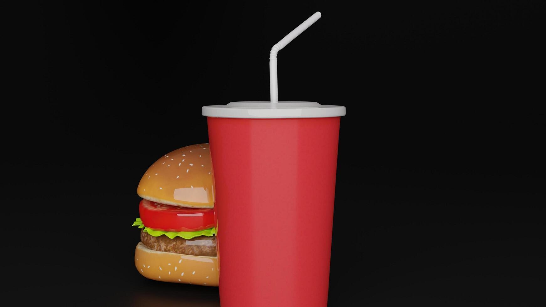a hamburger and a red drink next to each other photo
