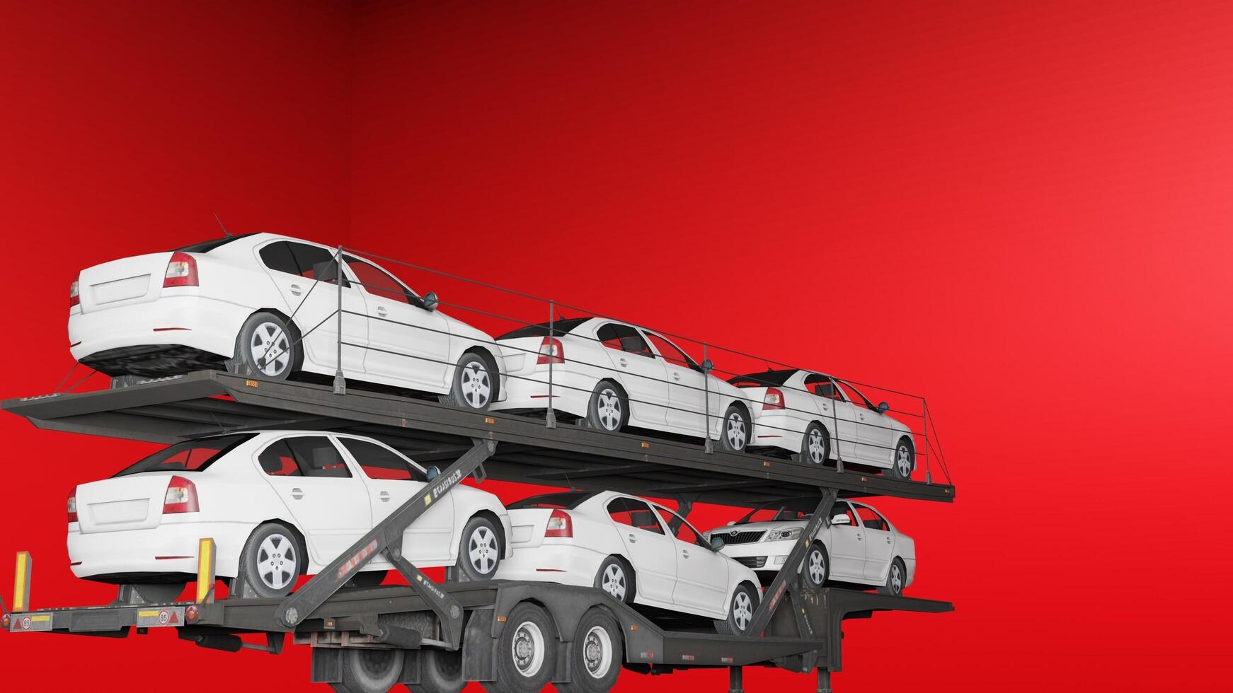 A white car is being loaded onto a flatbed truck photo