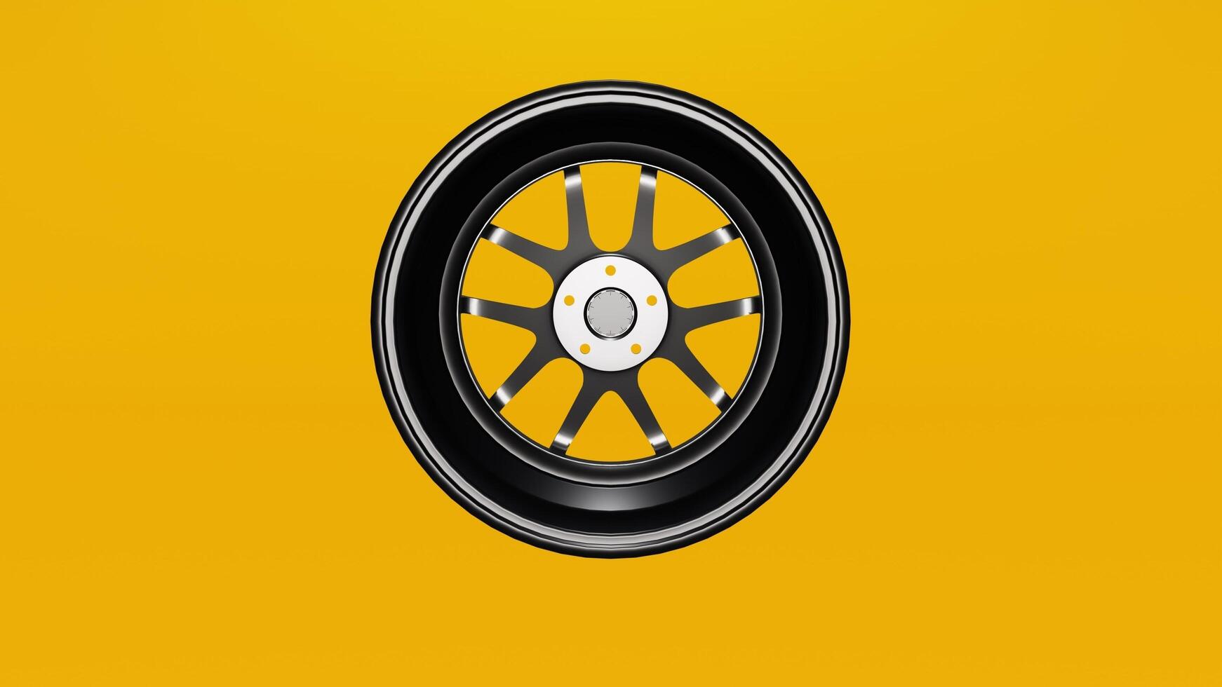 A yellow background with a black wheel on it photo