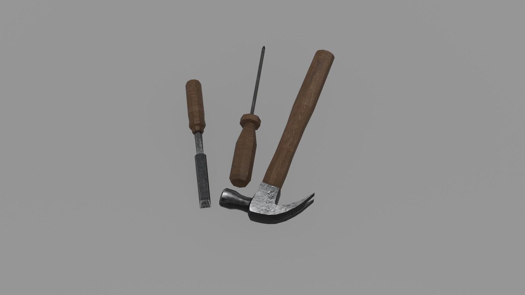 A hammer, screwdriver and screwdriver on a gray background photo