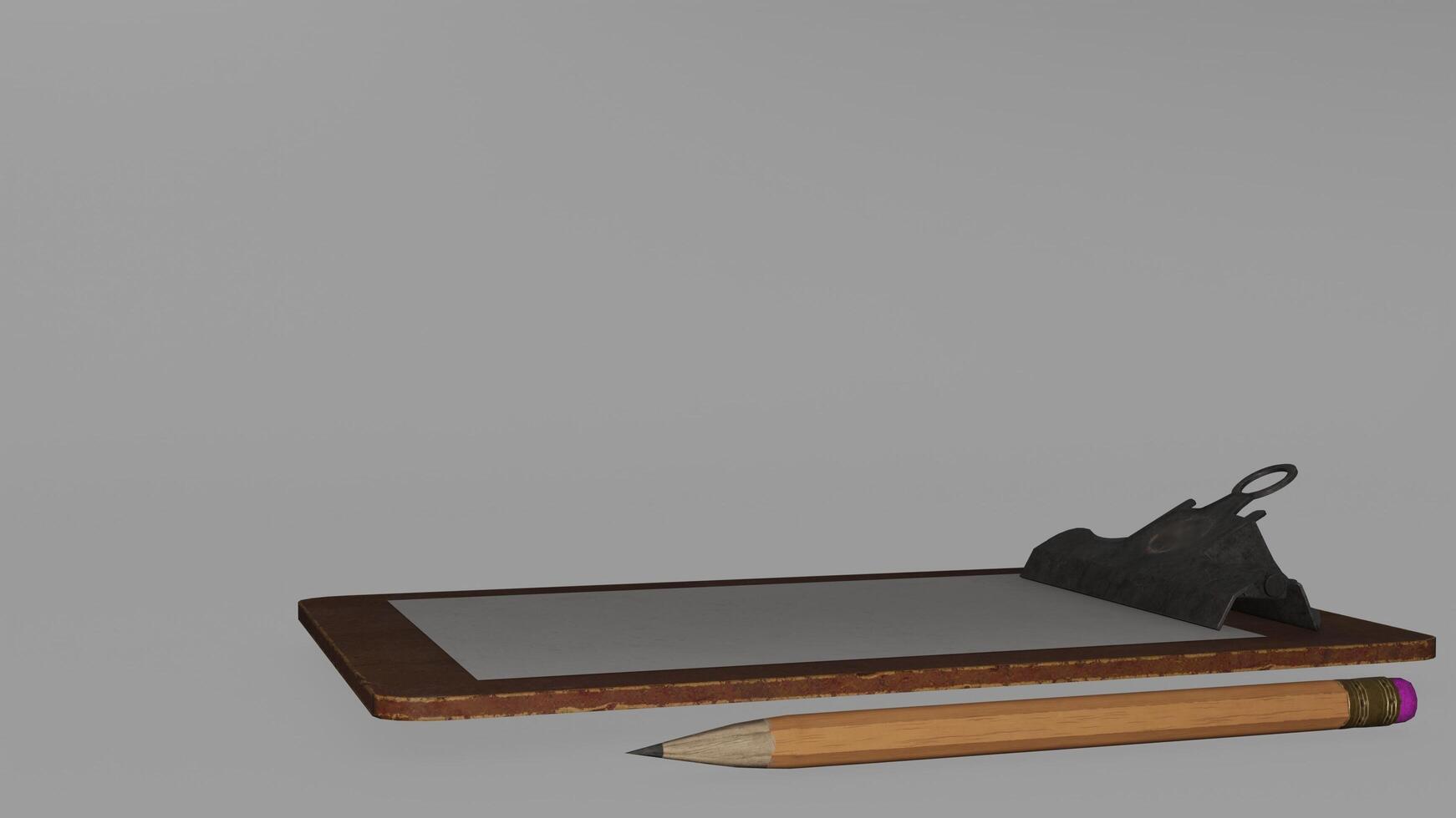A pencil and clipboard on a table photo