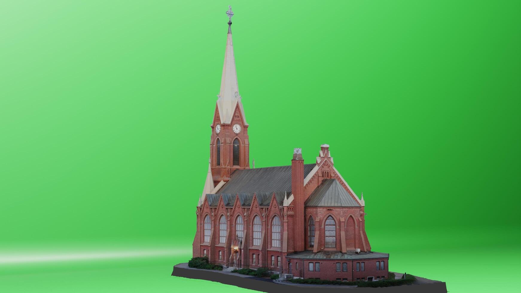 A model of a church on a green screen photo