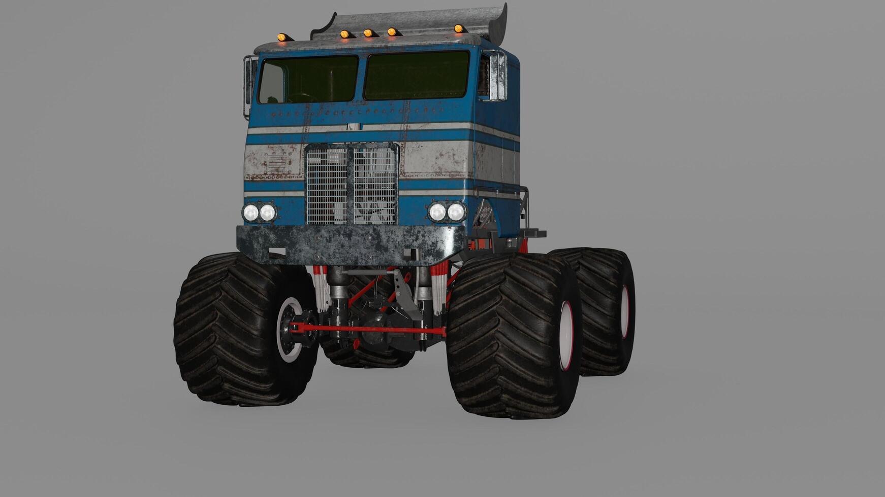 A blue and white truck with large tires photo