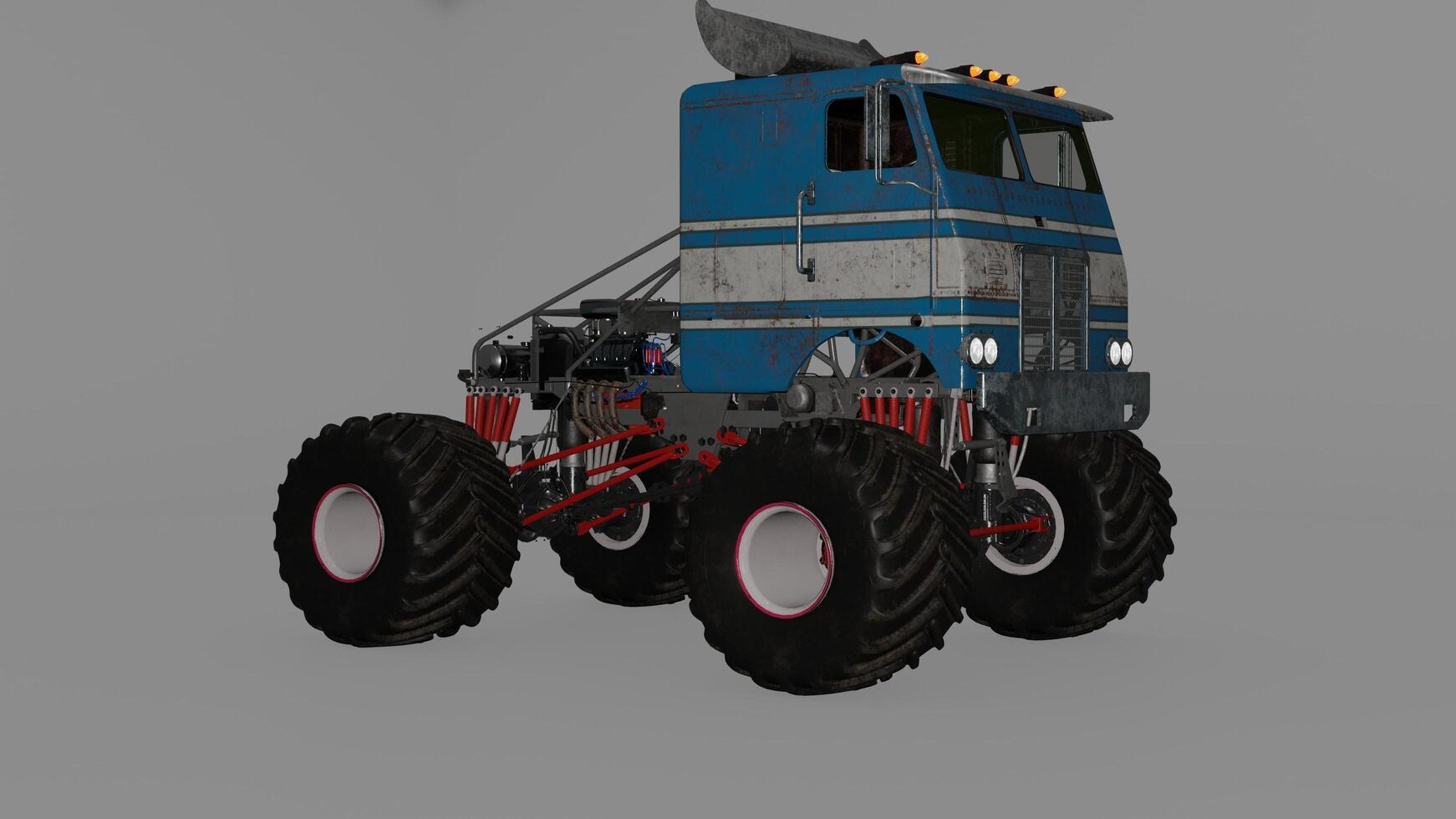 A blue and white monster truck with large tires photo