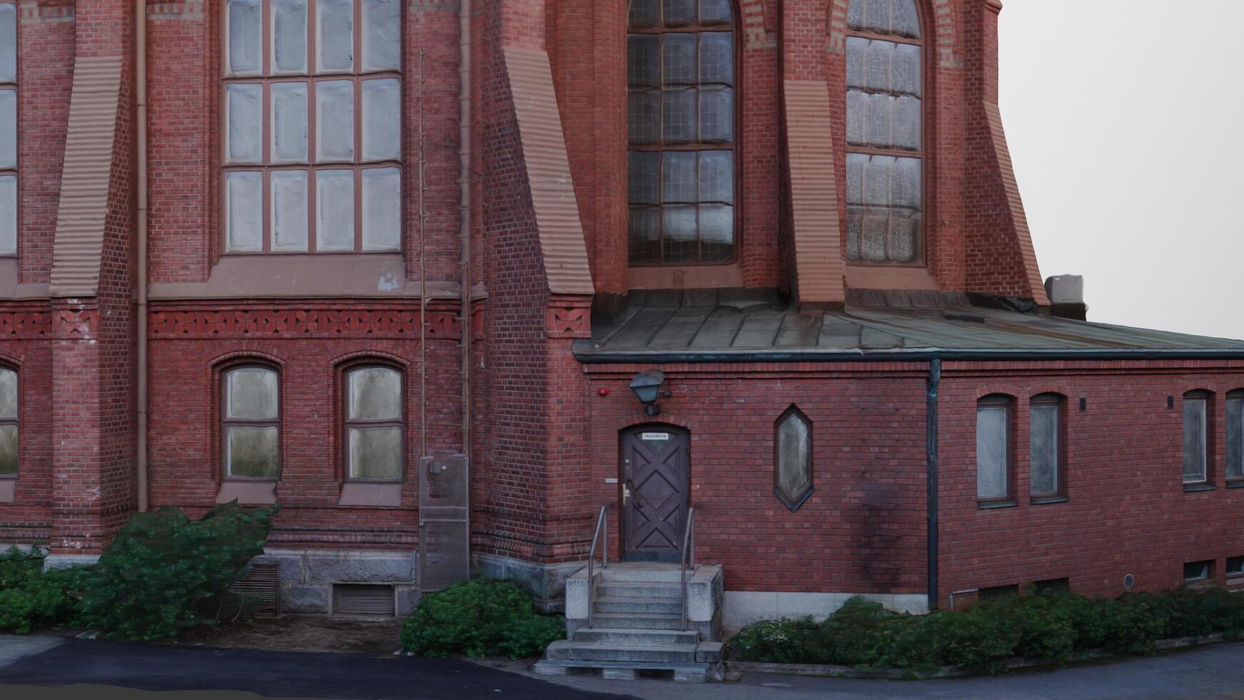 A large red building with a clock on the side photo
