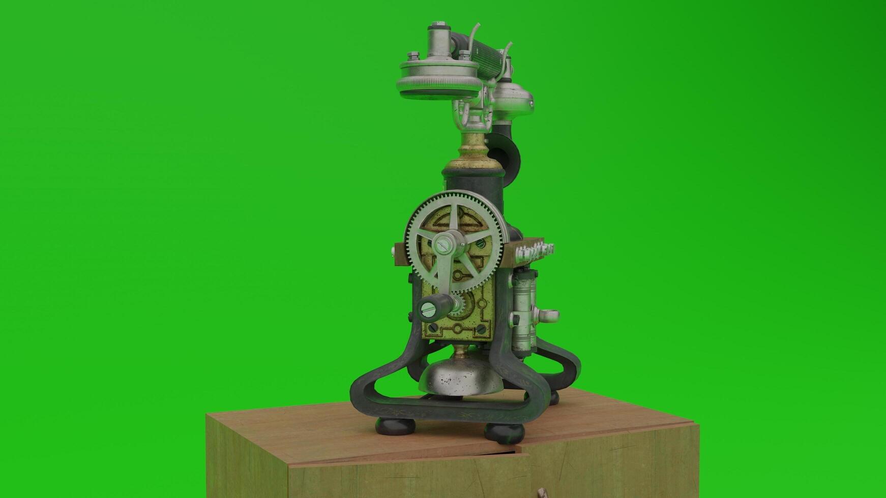 A green screen with a small machine on top photo